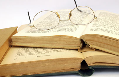 glasses on top of books