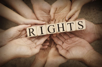 hands holding blocks that spell the word rights